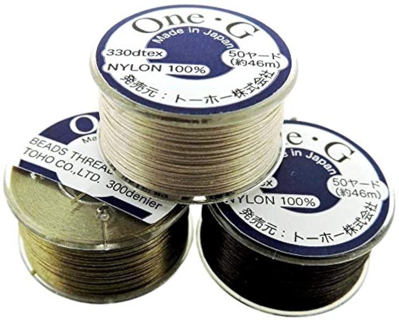 TOHO Bundle of 3 Colors: Toho One-G Beading Thread, 50 Yards per Bobbin, Beige, Brown & Sand Ash (Pack of 3 bobbins) - Image 1